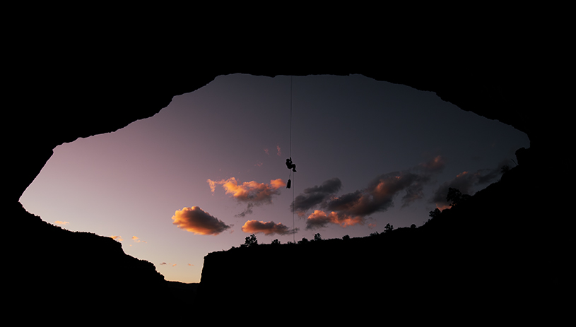 A cave specialist enjoys a serene climb from the cave’s entrance at the end of a long day. STEPHEN EGINOIRE