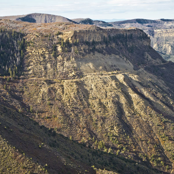 A view of the trail that cuts across a steep shale cliff