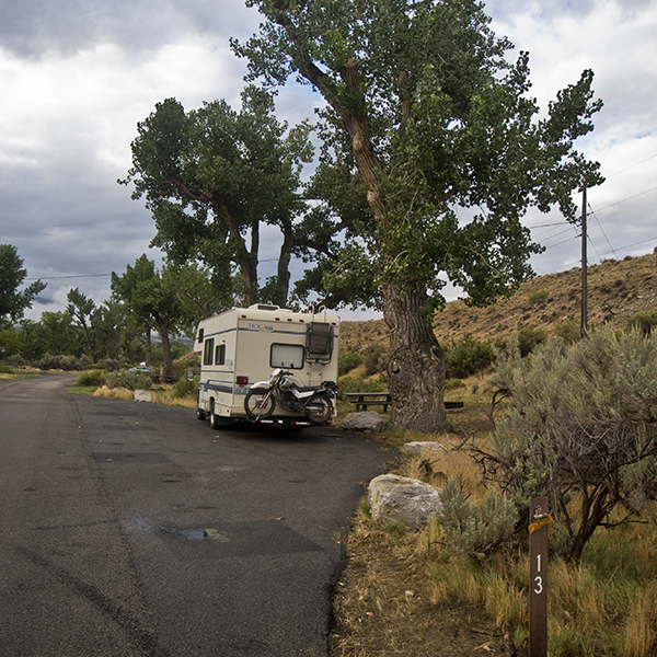 An RV in a paved pullout campsite at the Green River Campground