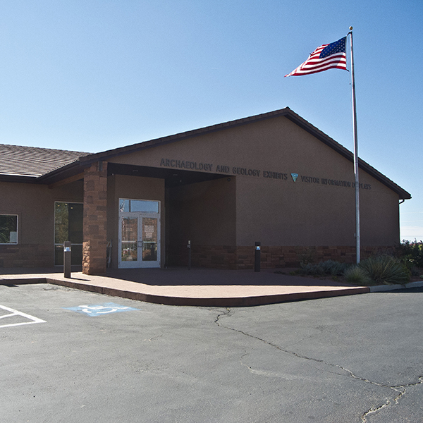 A brown visitor center building