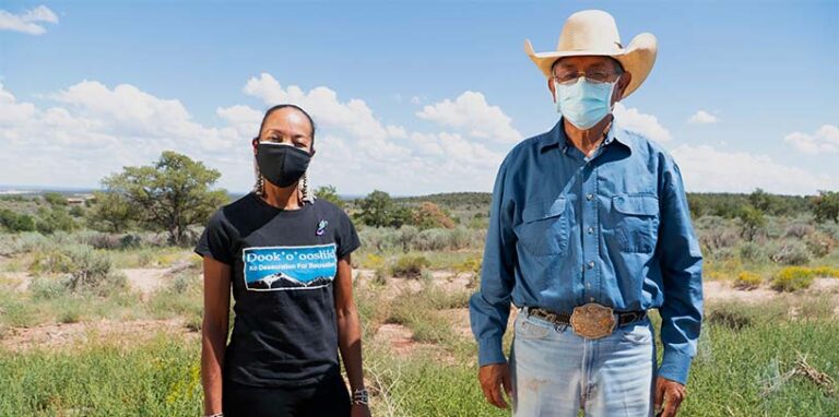 Herman and Radmilla Cody, in masks