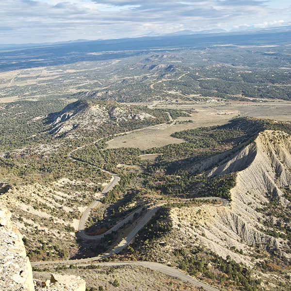 A view of the Mancos Valley from Point Lookout, including the park road and shale hills