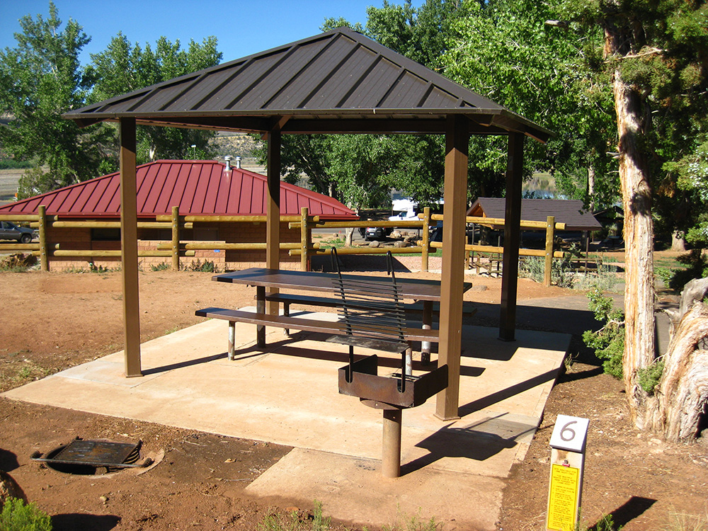 Picnic area with tables and shade structure