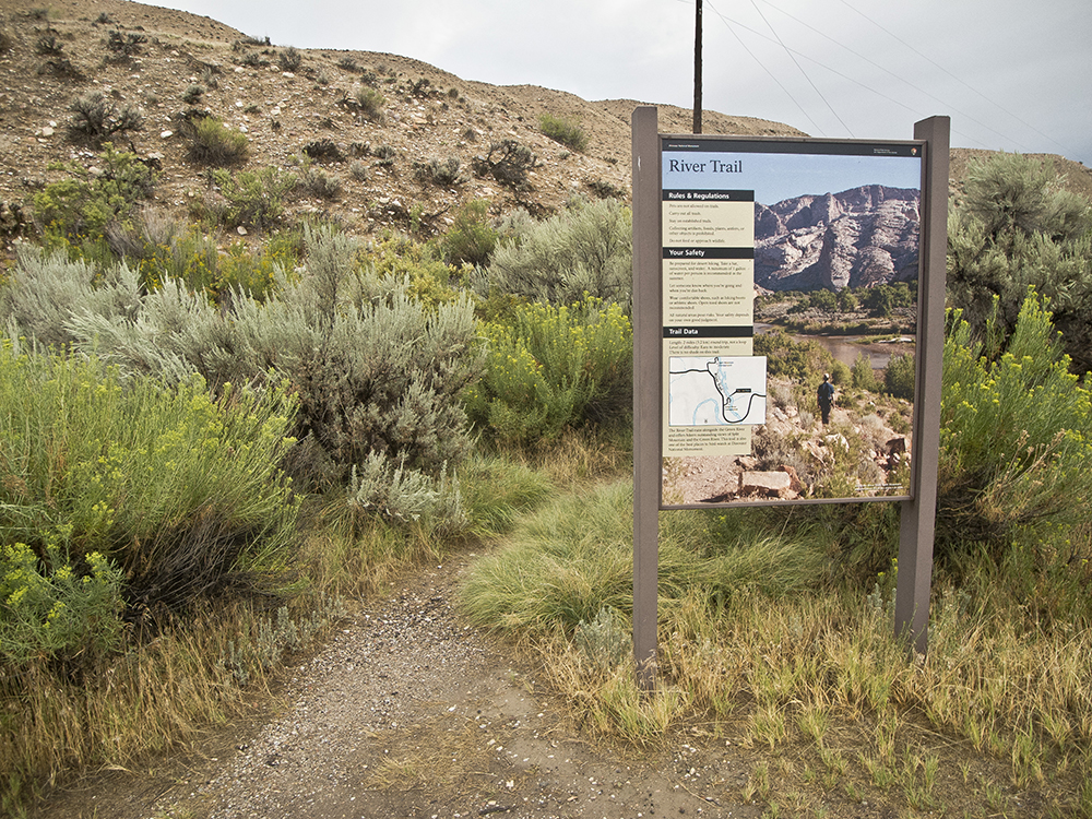 Informational board at the start of the river trail