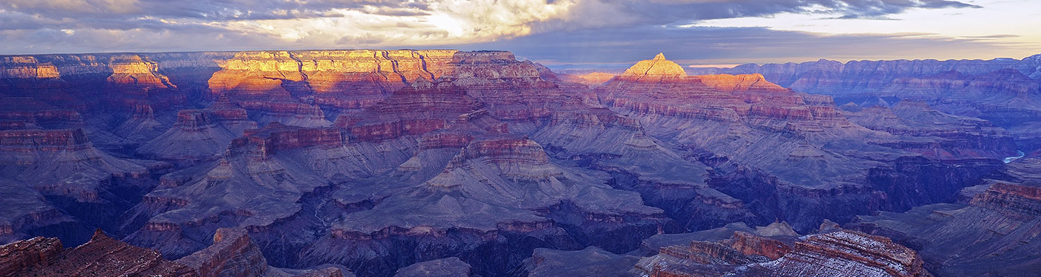 Light kisses the top cliffs in the Grand Canyon