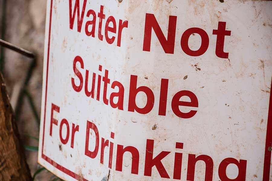 A sign reads "Water Not Suitable for Drinking"