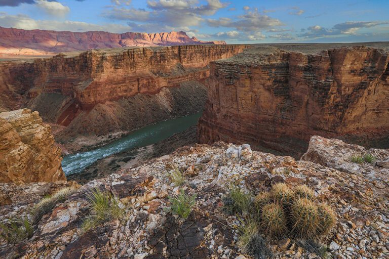 View of Colorado River and Marble Canyon, blue river with rapids and pink cliffs, East section of Baaj Nwaavjo I'tah Kukveni National Monument