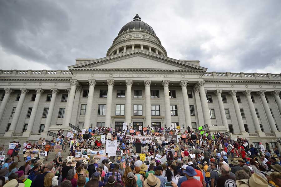 Supporters of Bears Ears National Monument rally on the front steps of the Utah state capitol.