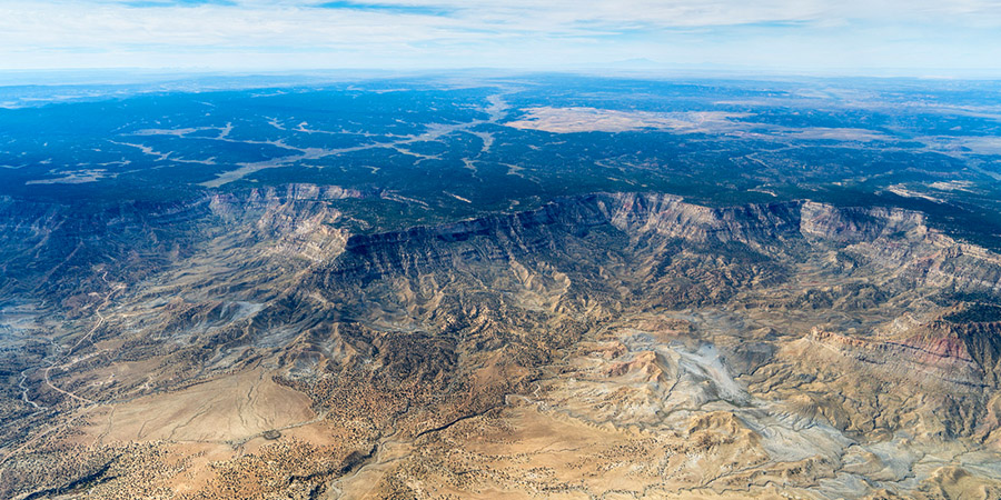 Aerial view of Black Mesa, a forested mesa.