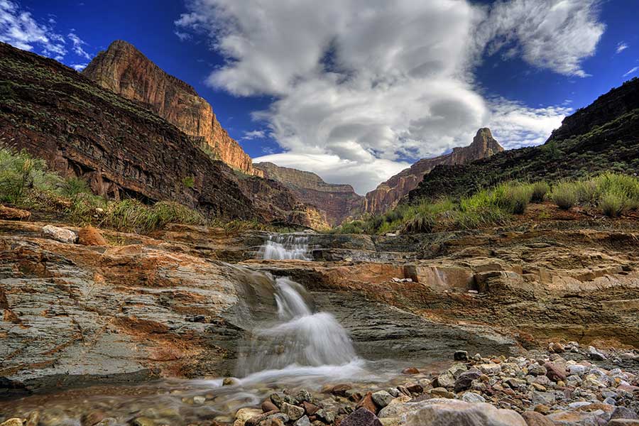 A small waterfall cascades down Stone Creek in the Grand Canyon.